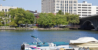 Pictured: Downtown buildings across the Rock River in Rockford Illinois.