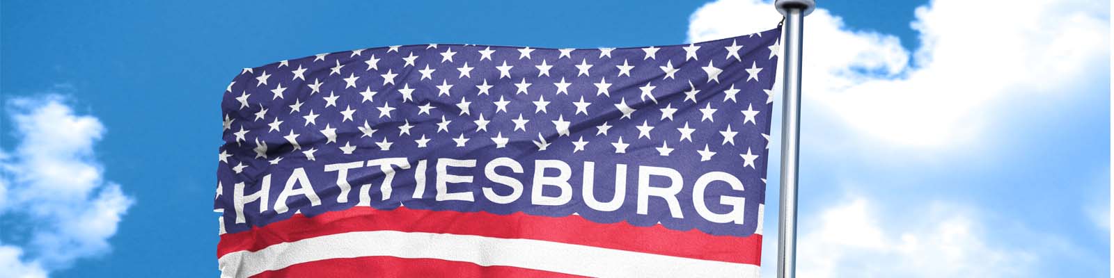 This is an image of the American flag with the word Hattiesburg in Hattiesburg Mississippi where ASTA-USA provides professional translation services.